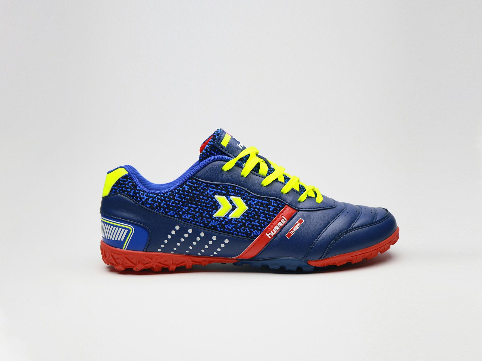 Blue football shoe on white before
